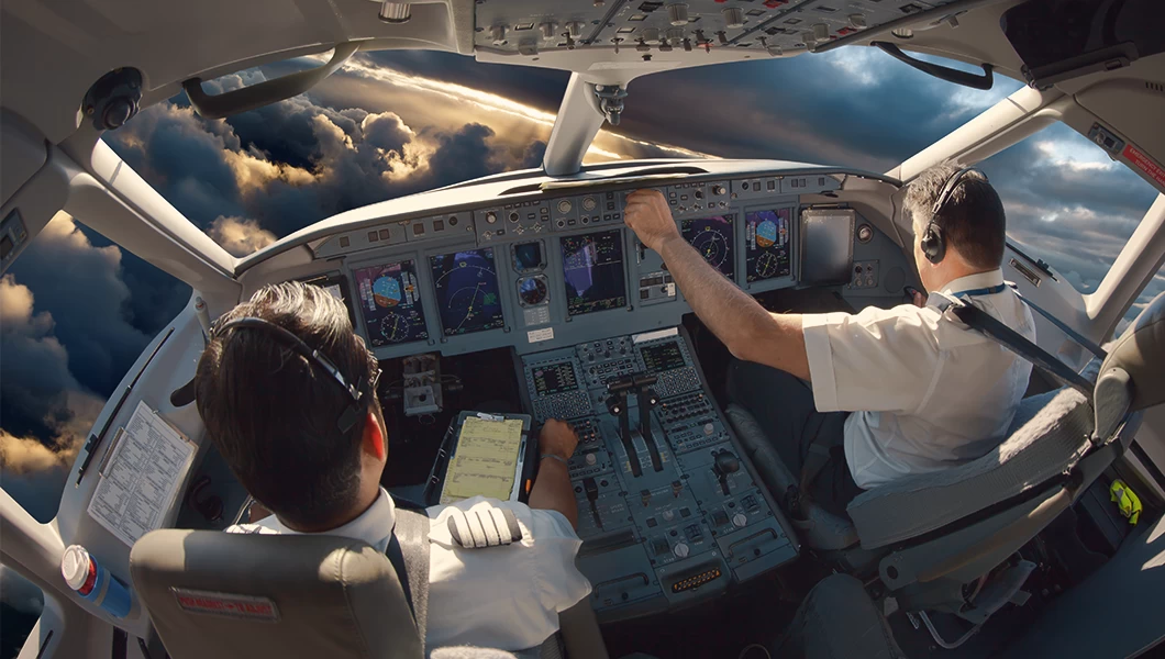 Pilots navigating through clouds, representing leaders managing AI transformation